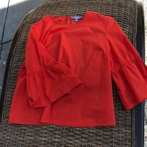 Bright orange belled sleeve top. Size Large